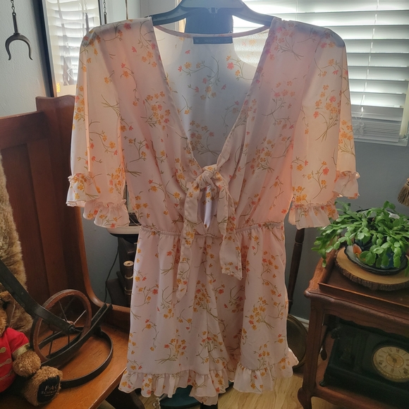 Floral Pink Ruffle romper - Picture 1 of 4